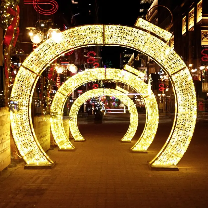 A series of lit arches on Sparks Street